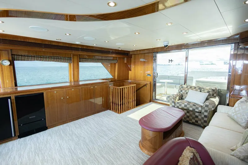 Slide: The Image of Luxurious interior of 2009 Hargrave Enclosed Bridge yacht with elegant wood finishes and ocean view. - 13