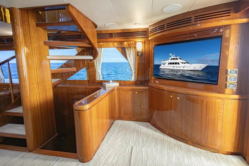 Slide: The Image of Luxurious 2009 Hargrave Enclosed Bridge yacht interior with elegant wood finishes and staircase. - 14