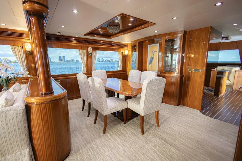 Slide: The Image of Luxurious 2009 Hargrave Enclosed Bridge yacht interior with elegant dining area and ocean view. - 16