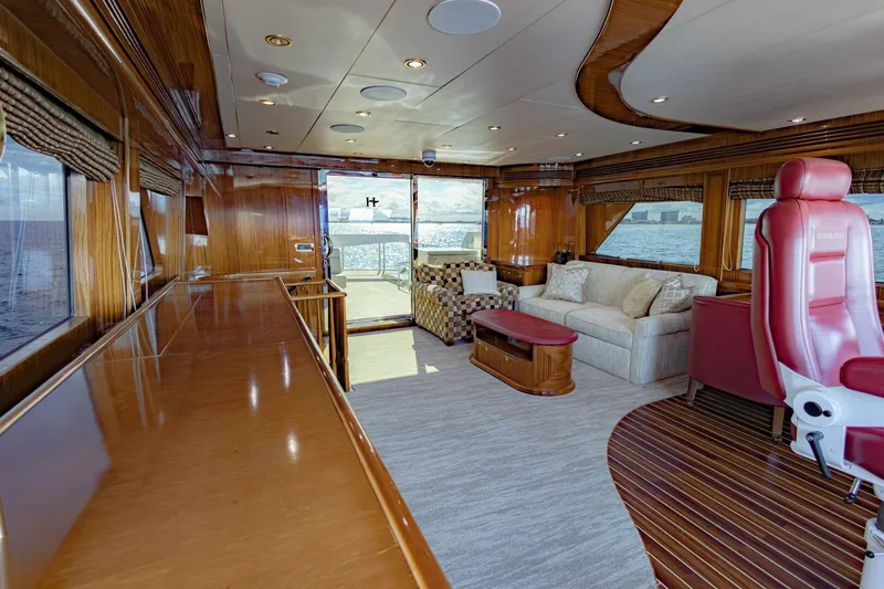 Slide: The Image of Luxurious interior of 2009 Hargrave Enclosed Bridge yacht with elegant wood finishes and plush seating. - 30