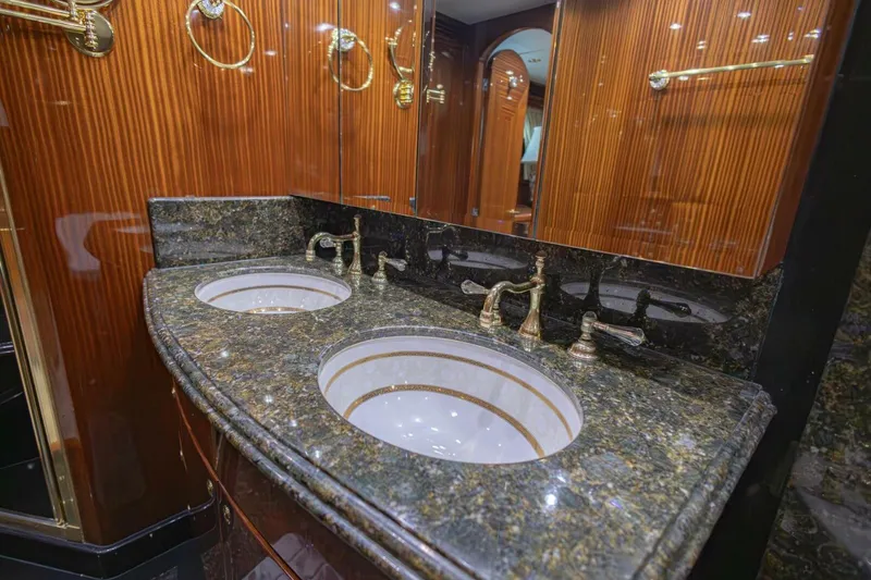 Slide: The Image of Luxurious bathroom with dual sinks and marble countertop in 2009 Hargrave Enclosed Bridge yacht. - 37