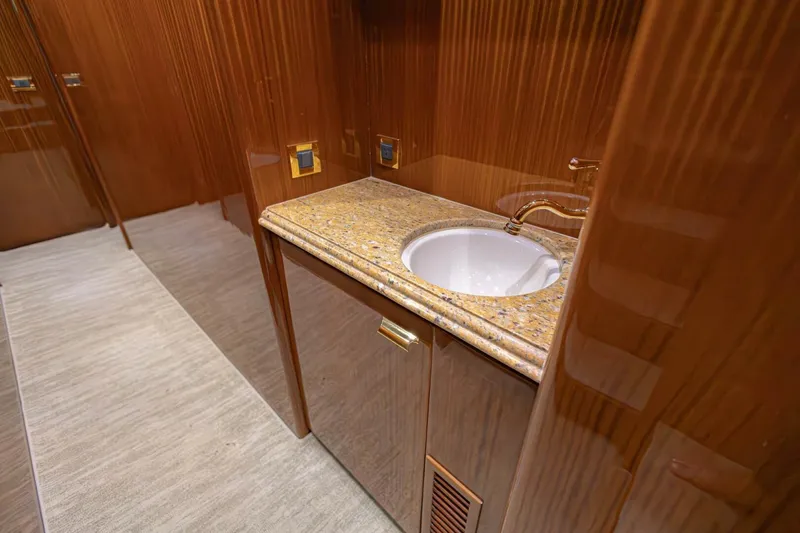 Slide: The Image of Luxurious 2009 Hargrave Enclosed Bridge yacht bathroom with elegant wood and granite finishes. - 40