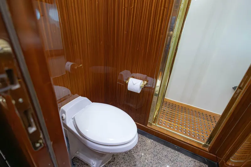 Slide: The Image of Luxurious bathroom in 2009 Hargrave Enclosed Bridge yacht with wood paneling and modern fixtures. - 44