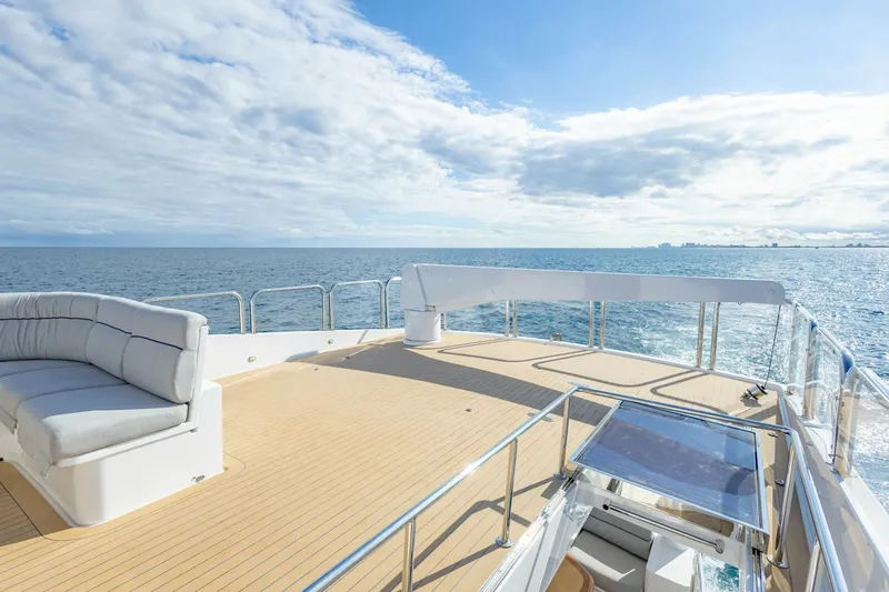 Slide: The Image of Luxurious 2009 Hargrave Enclosed Bridge yacht deck with ocean view and seating area. - 53