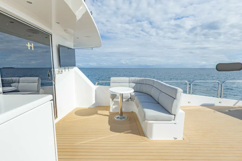 Slide: The Image of Luxurious 2009 Hargrave Enclosed Bridge yacht deck with ocean view and seating area. - 54