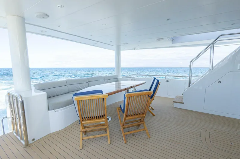 Slide: The Image of Luxurious 2009 Hargrave Enclosed Bridge yacht deck with ocean view and elegant seating. - 61
