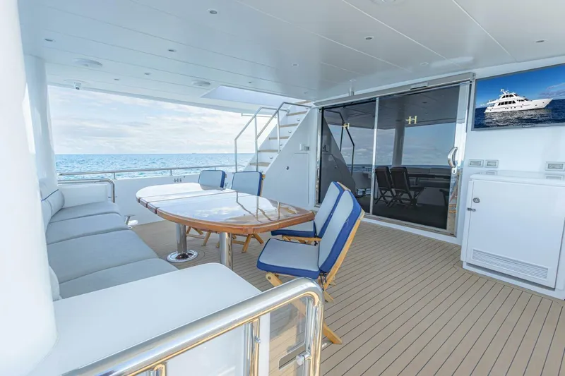 Slide: The Image of Luxurious 2009 Hargrave Enclosed Bridge yacht deck with seating and ocean view. - 62