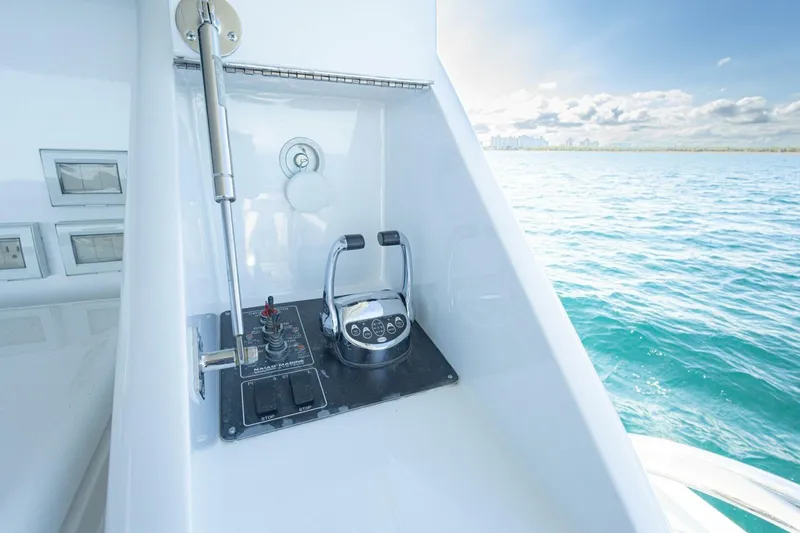 Slide: The Image of Control panel on 2009 Hargrave Enclosed Bridge yacht, overlooking ocean waters. - 65
