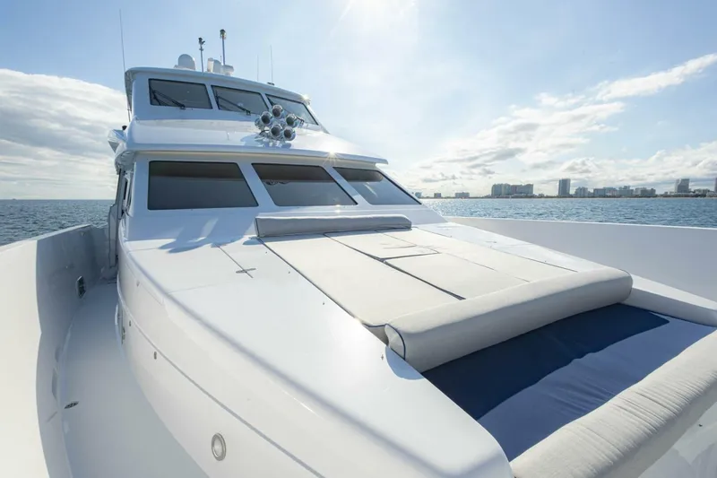 Slide: The Image of Luxurious 2009 Hargrave Enclosed Bridge yacht on open water, featuring sleek design and sunbathing area. - 72