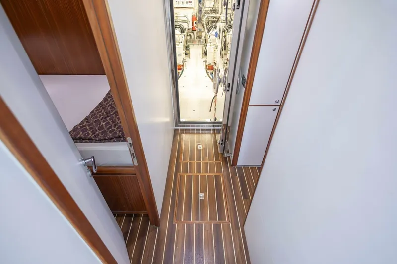 Slide: The Image of Luxurious 2009 Hargrave Enclosed Bridge yacht interior with wood flooring and cabin access. - 78