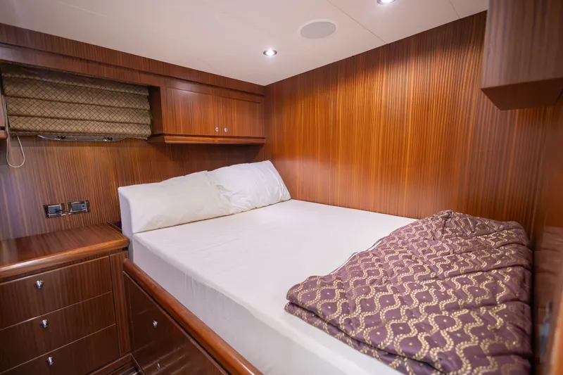 Slide: The Image of Luxurious cabin interior of 2009 Hargrave Enclosed Bridge yacht with wood paneling. - 79