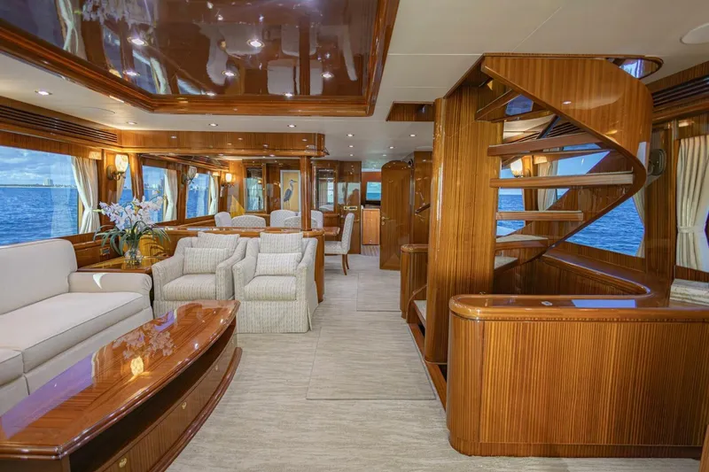 Slide: The Image of Luxurious interior of 2009 Hargrave Enclosed Bridge yacht with elegant wood finishes and ocean view. - 9