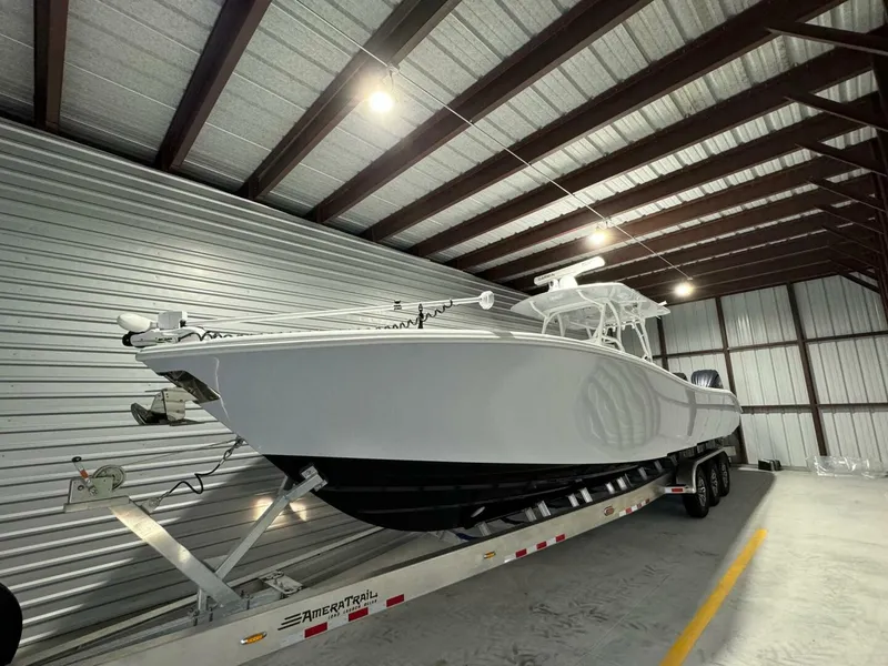 Slide: The Image of 2024 Yellowfin 36 boat on trailer in storage facility. - 2