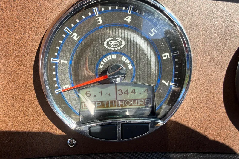 Slide: The Image of Tachometer of 2018 Cobalt CS22 showing 5.1 feet depth and 344.4 hours. - 5