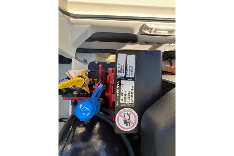 Slide: The Image of Engine compartment of a 2018 Cobalt CS22 boat with labeled components. - 7