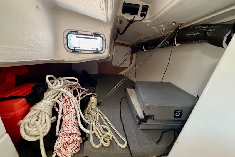 Slide: The Image of Interior of 2020 Jeanneau Sun Fast 3300 sailboat with ropes and storage. - 46