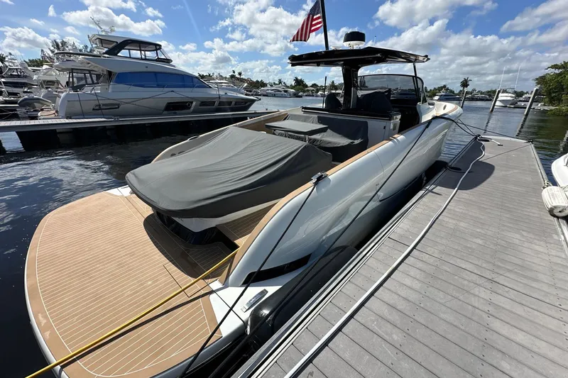 Slide: The Image of 2025 Solaris Power 44 Open yacht docked under a sunny sky. - 10