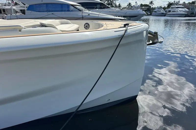 Slide: The Image of 2025 Solaris Power 44 Open yacht docked on calm water. - 14