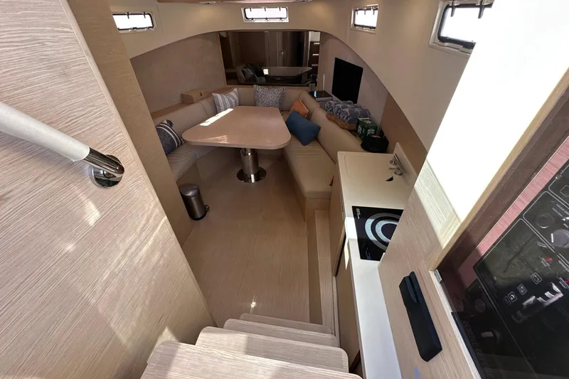 Slide: The Image of Luxurious interior of 2025 Solaris Power 44 Open yacht with modern seating and kitchen area. - 15