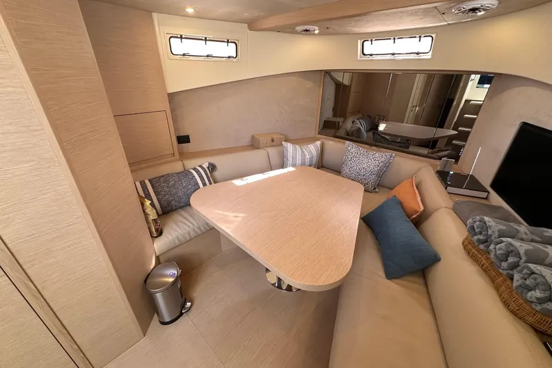 Slide: The Image of Luxurious interior of 2025 Solaris Power 44 Open yacht with cozy seating and elegant decor. - 21