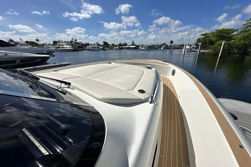 Slide: The Image of 2025 Solaris Power 44 Open yacht docked on a sunny day, showcasing sleek design and luxury. - 27