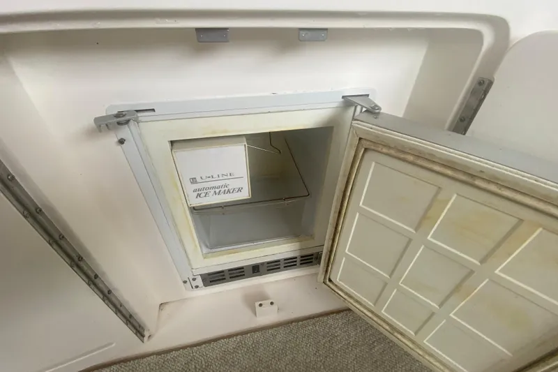 Slide: The Image of Open U-Line automatic ice maker on 2001 Sea Ray 340 Sundancer boat. - 10