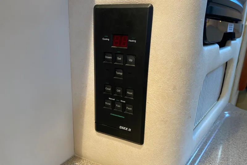 Slide: The Image of Control panel on a 2001 Sea Ray 340 Sundancer boat interior. - 20