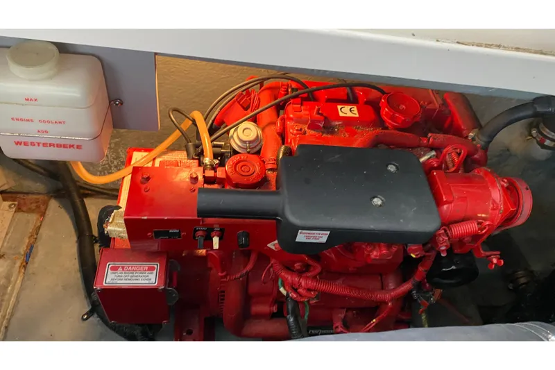 Slide: The Image of Engine compartment of a 2001 Sea Ray 340 Sundancer with Westerbeke generator. - 34