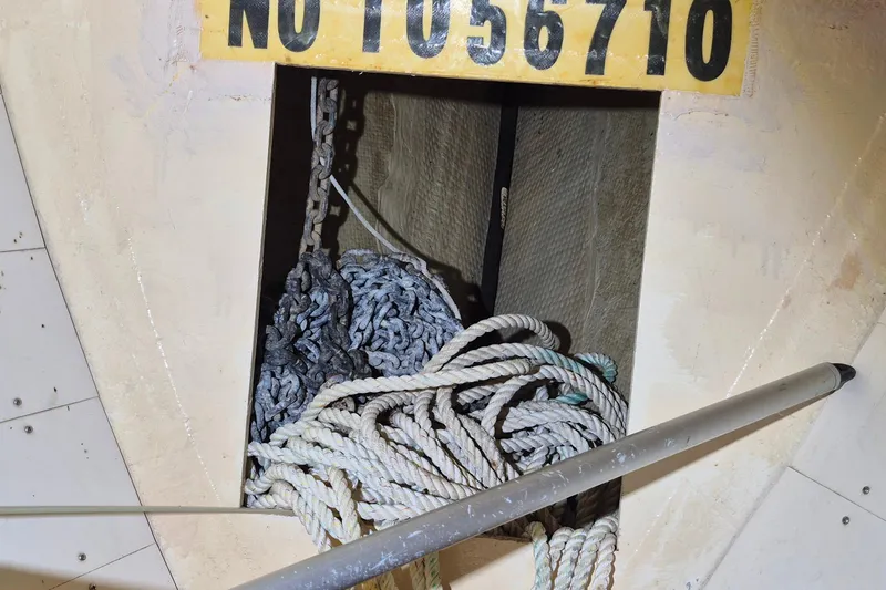 Slide: The Image of Anchor chain and ropes in a 1996 Morris Yachts Frances sailboat compartment. - 25