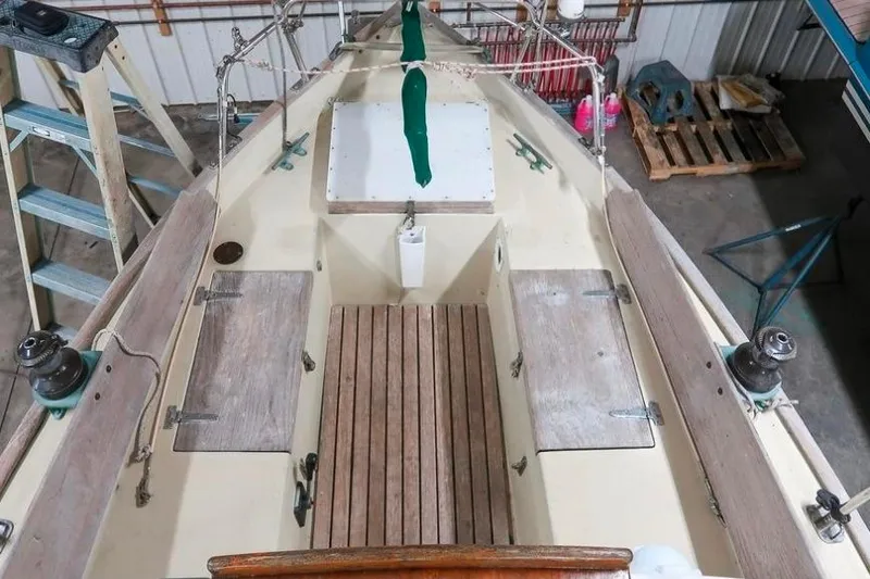 Slide: The Image of 1996 Morris Yachts Frances sailboat cockpit with wooden seating and nautical equipment. - 3