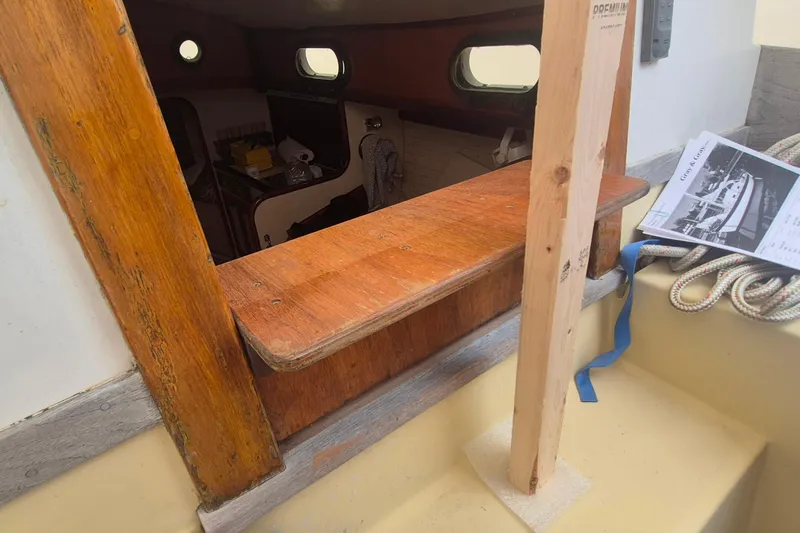 Slide: The Image of Interior view of a 1996 Morris Yachts Frances sailboat, showcasing wooden cabin details. - 37
