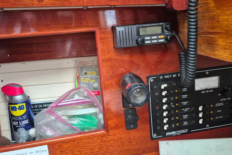 Slide: The Image of Interior of a 1996 Morris Yachts Frances showing control panel and maintenance supplies. - 38