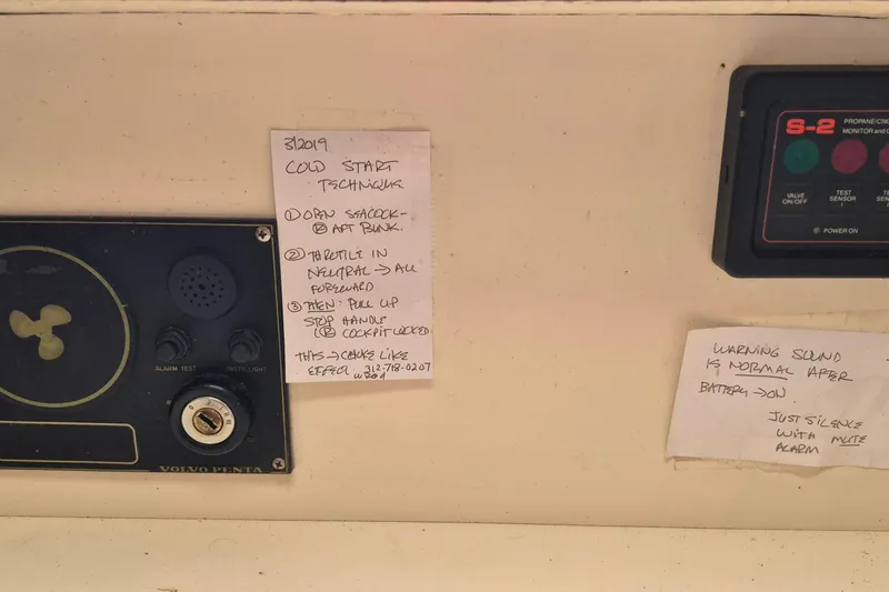 Slide: The Image of Control panel of a 1996 Morris Yachts Frances with handwritten notes for cold start technique. - 39