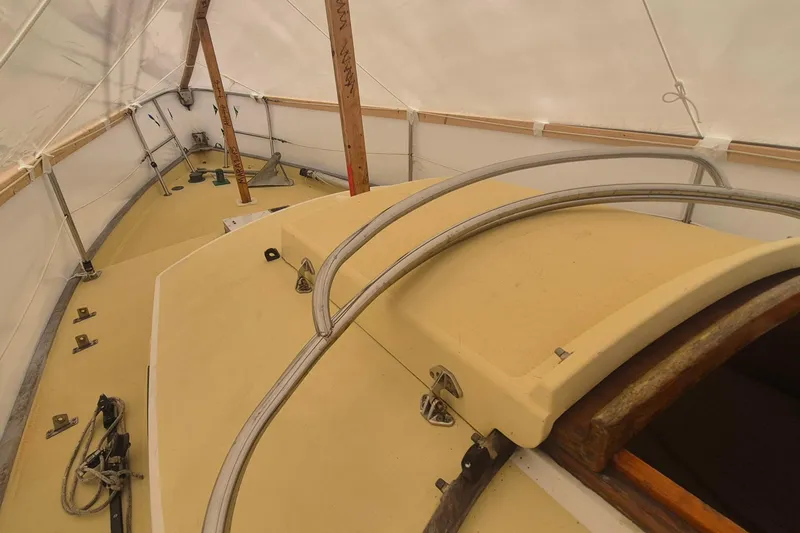 Slide: The Image of Covered deck of 1996 Morris Yachts Frances sailboat under protective shelter. - 41