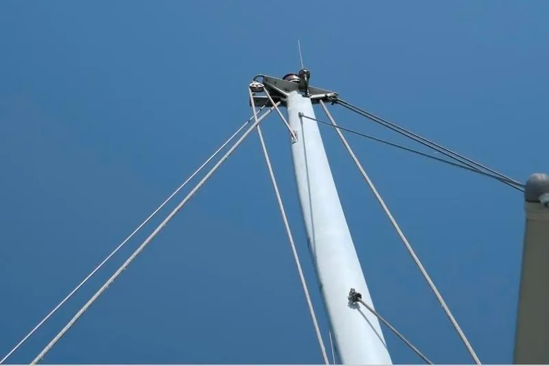 Slide: The Image of Mast of 1996 Morris Yachts Frances against clear blue sky. - 51