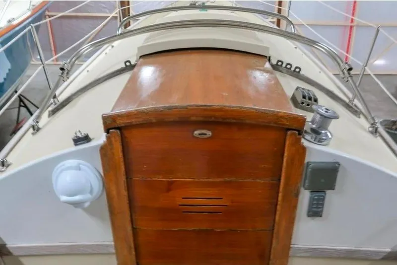 Slide: The Image of 1996 Morris Yachts Frances sailboat with wooden hatch and metal fittings. - 54