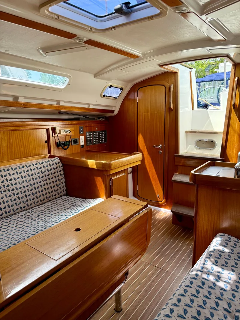 Slide: The Image of Interior of 2000 Dufour 32 Classic yacht cabin. - 21