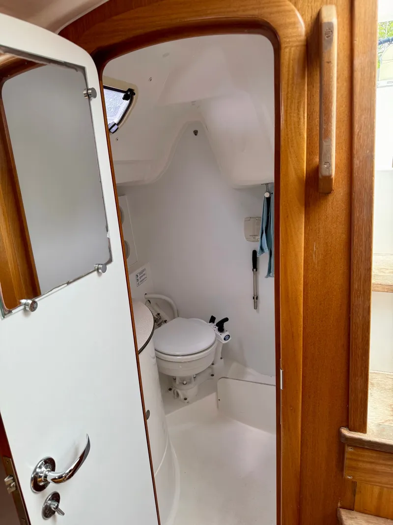 Slide: The Image of Interior view of the bathroom on a 2000 Dufour 32 Classic yacht. - 23