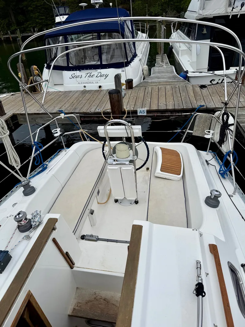 Slide: The Image of Dufour 32 Classic 2000 sailboat docked at marina. - 4