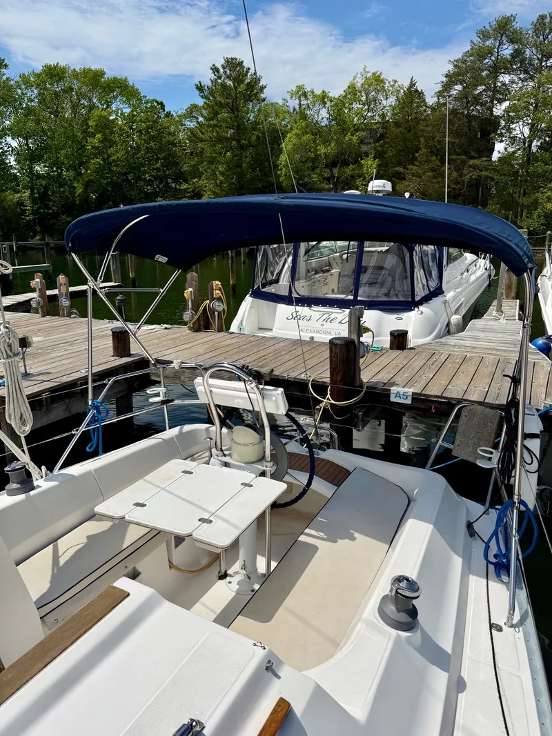 Slide: The Image of Dufour 32 Classic 2000 docked with blue sunshade. - 5