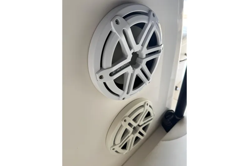 Slide: The Image of White JL Audio marine speakers on a 2015 Blackwood 27 boat. - 28