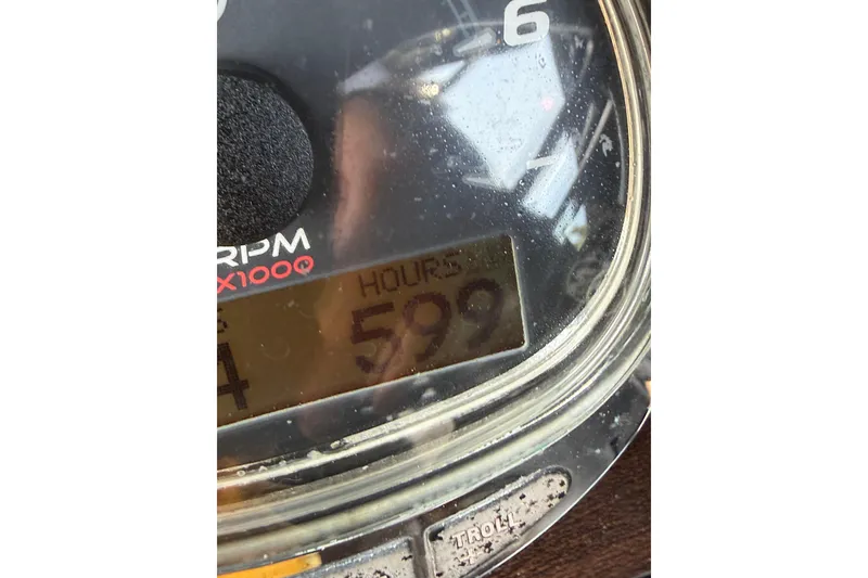 Slide: The Image of Close-up of Blackwood 27 tachometer showing 599 hours, 2015 model. - 30