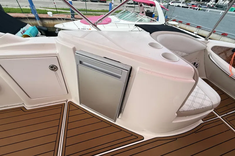 Slide: The Image of 2007 Meridian 459 Motoryacht deck with speaker and storage compartment. - 16