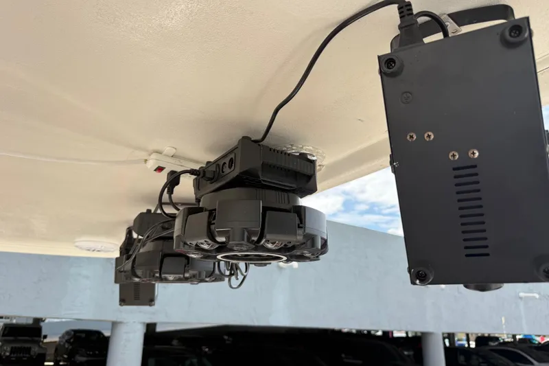 Slide: The Image of AGPTEK auto mode device installed on 2007 Meridian 459 Motoryacht, with marina background. - 39