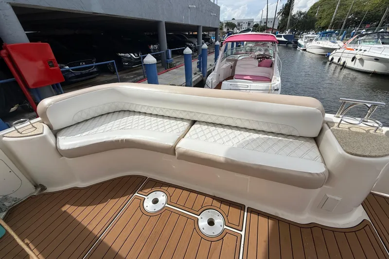 Slide: The Image of 2007 Meridian 459 Motoryacht deck with teak flooring and sliding glass door. - 41
