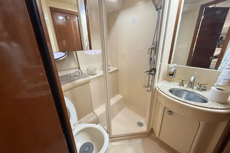 Slide: The Image of Bathroom interior of 2007 Meridian 459 Motoryacht with toilet and shower. - 62