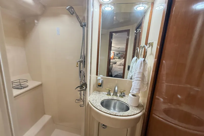 Slide: The Image of Luxurious 2007 Meridian 459 Motoryacht kitchen with modern appliances and elegant wood cabinetry. - 65