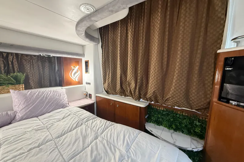 Slide: The Image of Bathroom vanity in 2007 Meridian 459 Motoryacht with granite countertop and mirror. - 78
