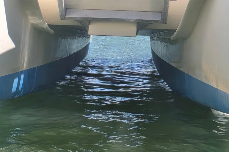 Slide: The Image of Underwater view of 2014 Custom Exuma Catamaran 32 hulls in clear water. - 25