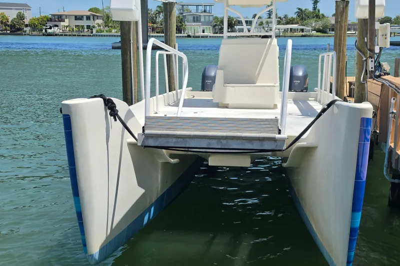 Slide: The Image of 2014 Custom Exuma Catamaran 32 deck with storage hatch and metal fittings. - 47
